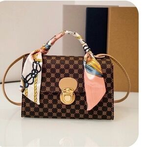 Elegant Brown Patterned Handbag with Scarf Accent